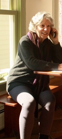 Tricia Bevan at desk